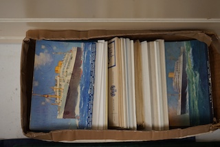 A box and two folders of postcards and a few cigarette cards, mainly relating to the Royal Mail Steam Packet Company and Royal Mail Lines Ltd., including a good quantity of 1930s and later postcards of cruise ships, many